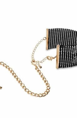 COAXcopenhagen.com Body Jewelry Black Metallic Cuffs With Gold Chain